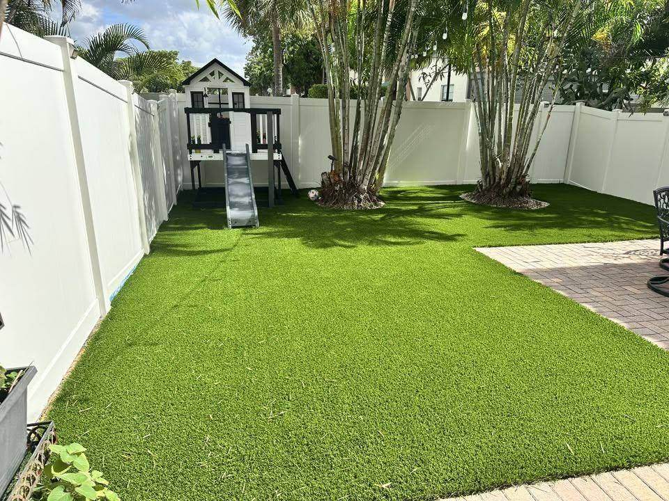 Backyard turf with playhouse