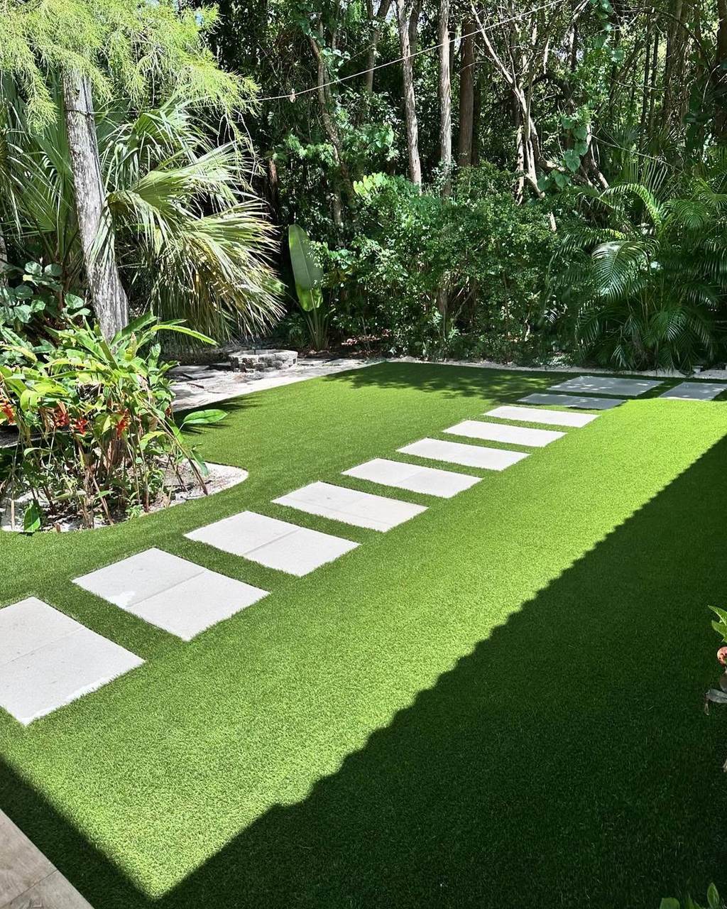 Turf walkway with paver stepping stones
